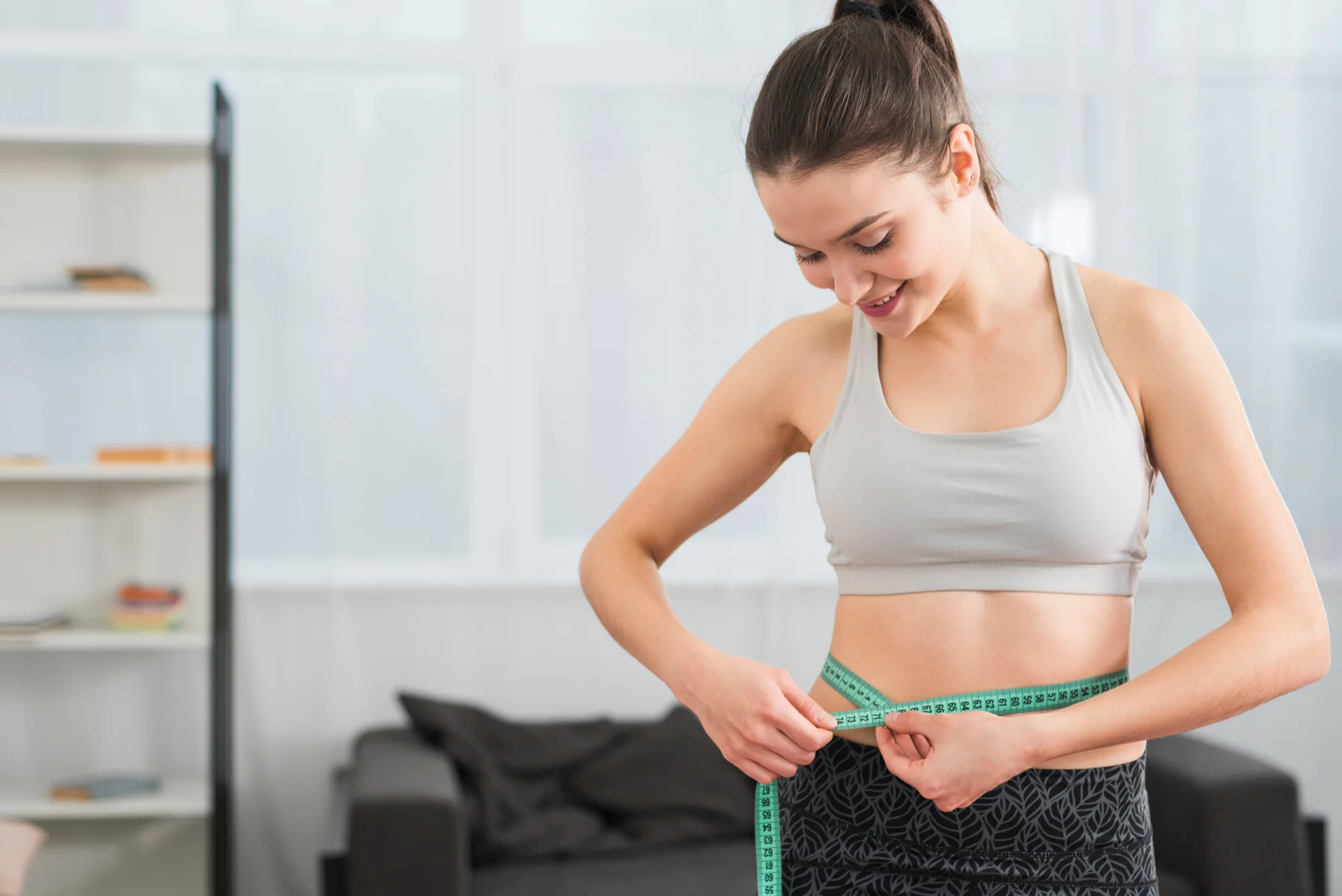 Benefits of liposculpture liposuction shown by reduced waist size