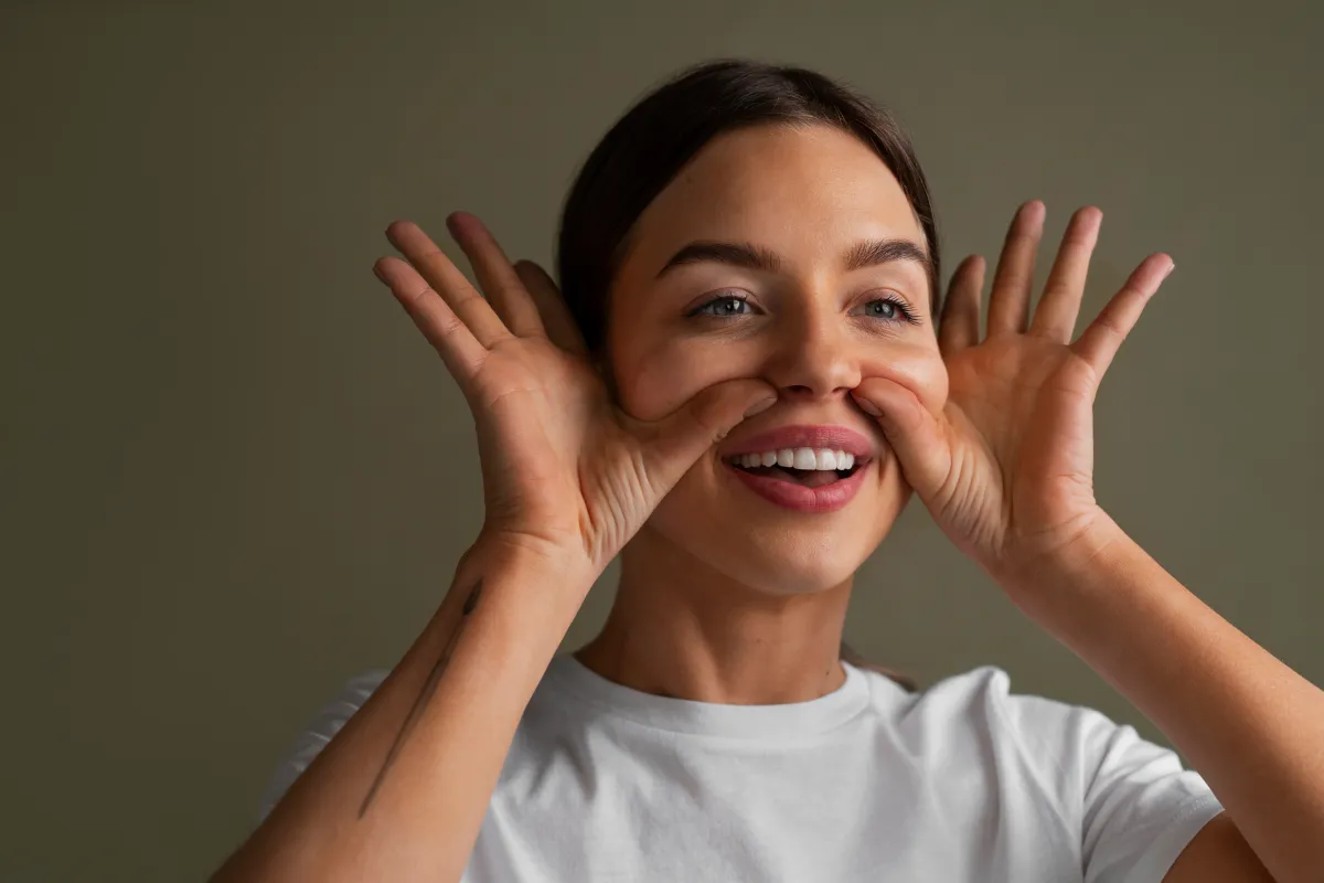 illustrating the repetitive muscle movements that lead to the formation of permanent smile lines and wrinkles around the mouth and nose